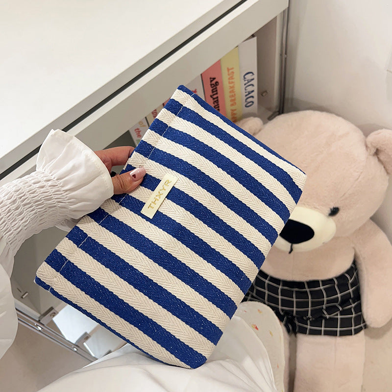 Striped canvas zippered cosmetic pouch clutch with padded lining and wristlet Bowlift