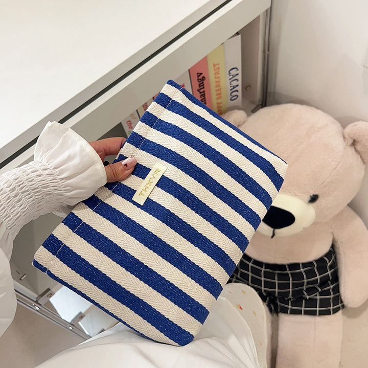Striped canvas zippered cosmetic pouch clutch with padded lining and wristlet Bowlift