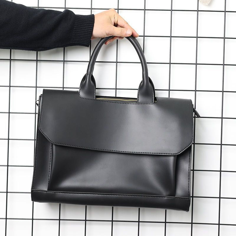 Elegant briefcase with practical outer pocket Bowlift