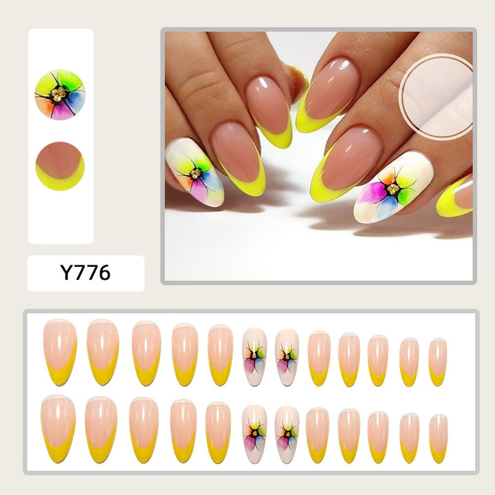 Artificial nails with colorful floral designs and striking color accents Bowlift