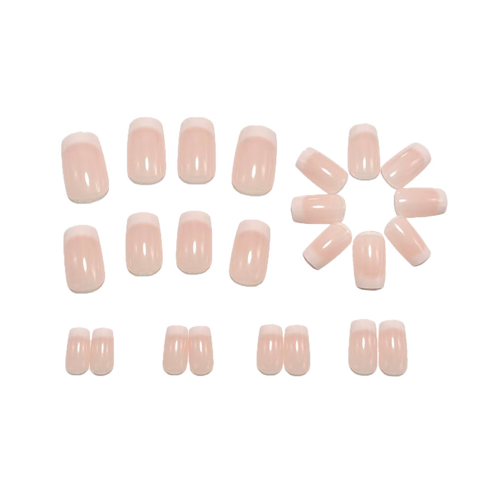Artificial nails in elegant French design Bowlift