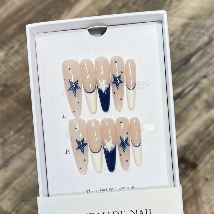 Artistic Stiletto Press-On Nail Set with Celestial Design Bowlift