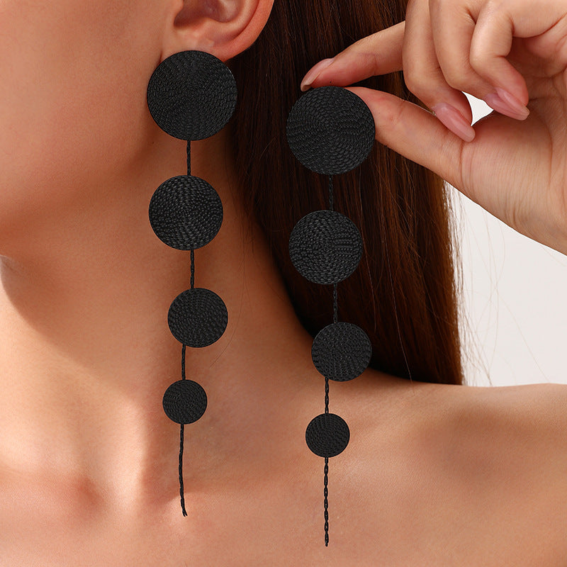 Long dangling earrings Bowlift