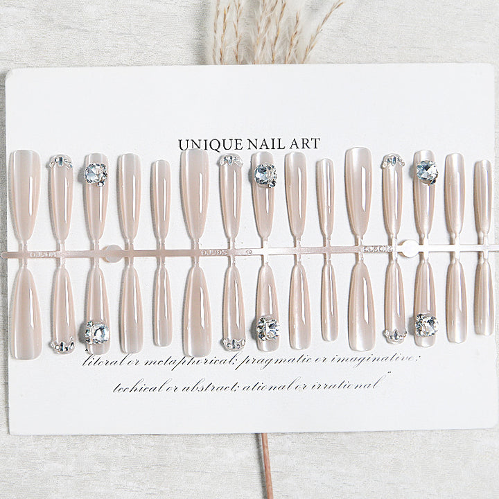 Acrylic nail set with glitter design and elegant 3D applications Bowlift