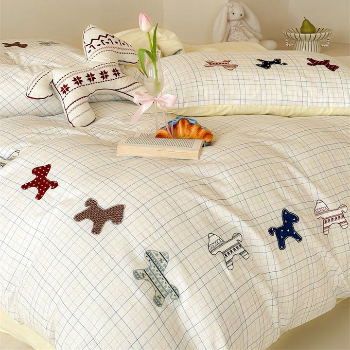 Children's bedding set made of cotton with embroidered dog appliqués and check pattern Bowlift