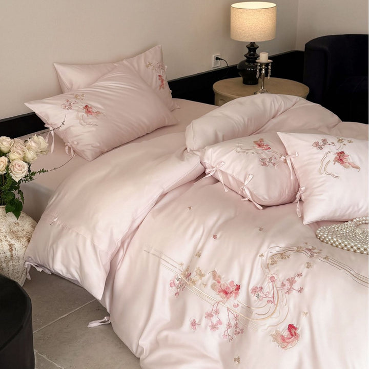 Embroidered satin bedding set with ribbon ties and delicate floral embroidery Bowlift
