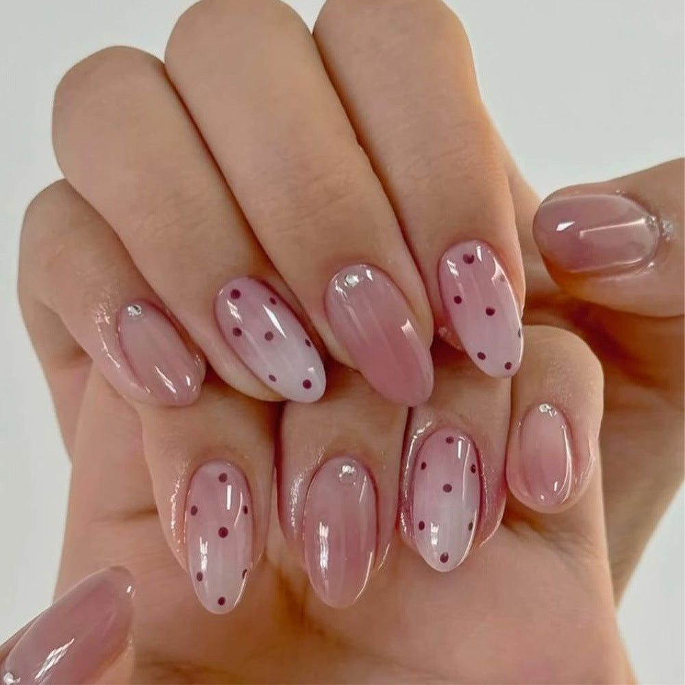 Artificial nails with elegant ombre effect and playful polka dot design Bowlift