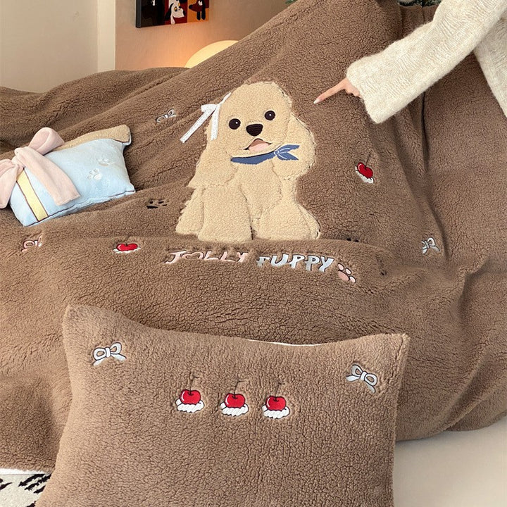 Plush bedding set with Sherpa finish, quilted cozy blanket, and embroidered puppy motif Bowlift
