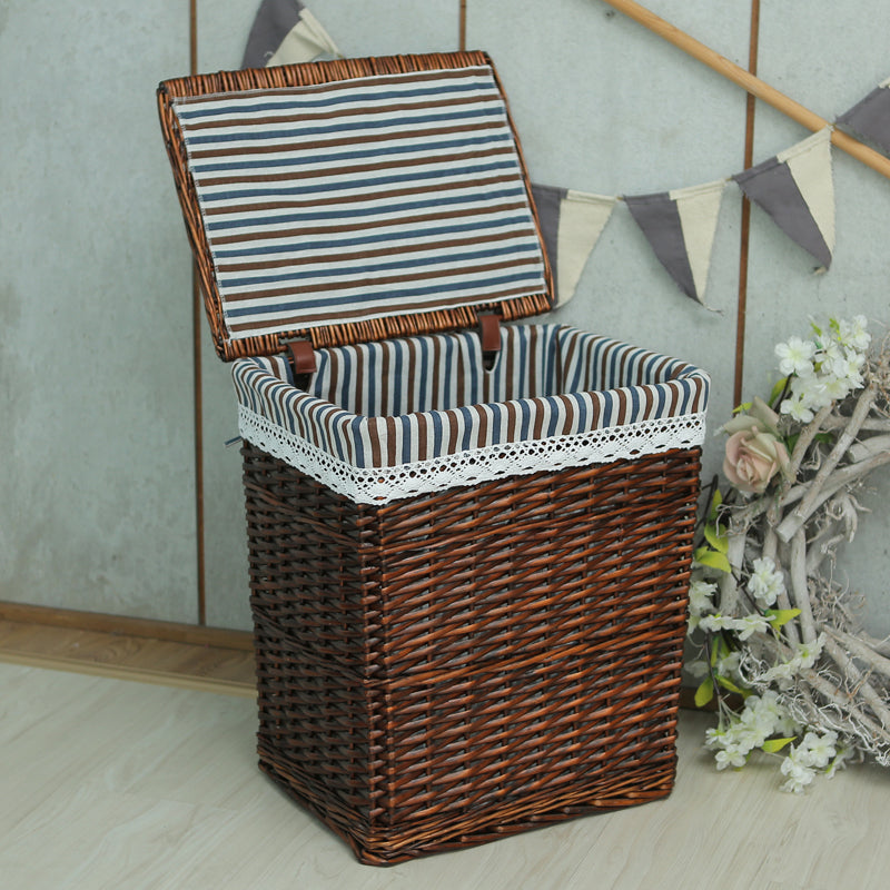 Women's laundry basket with elegant fabric cover and decorative elements Bowlift
