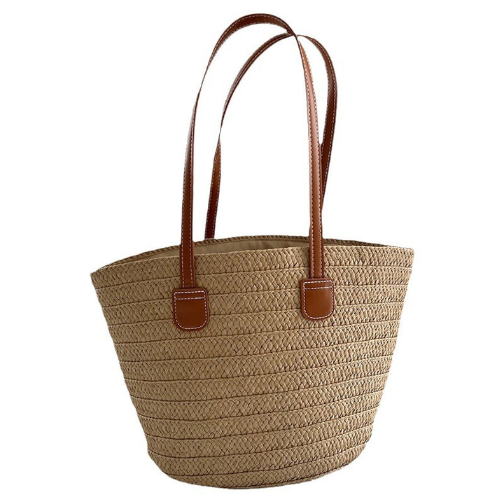 Handcrafted straw bag with elegant leather handles Bowlift