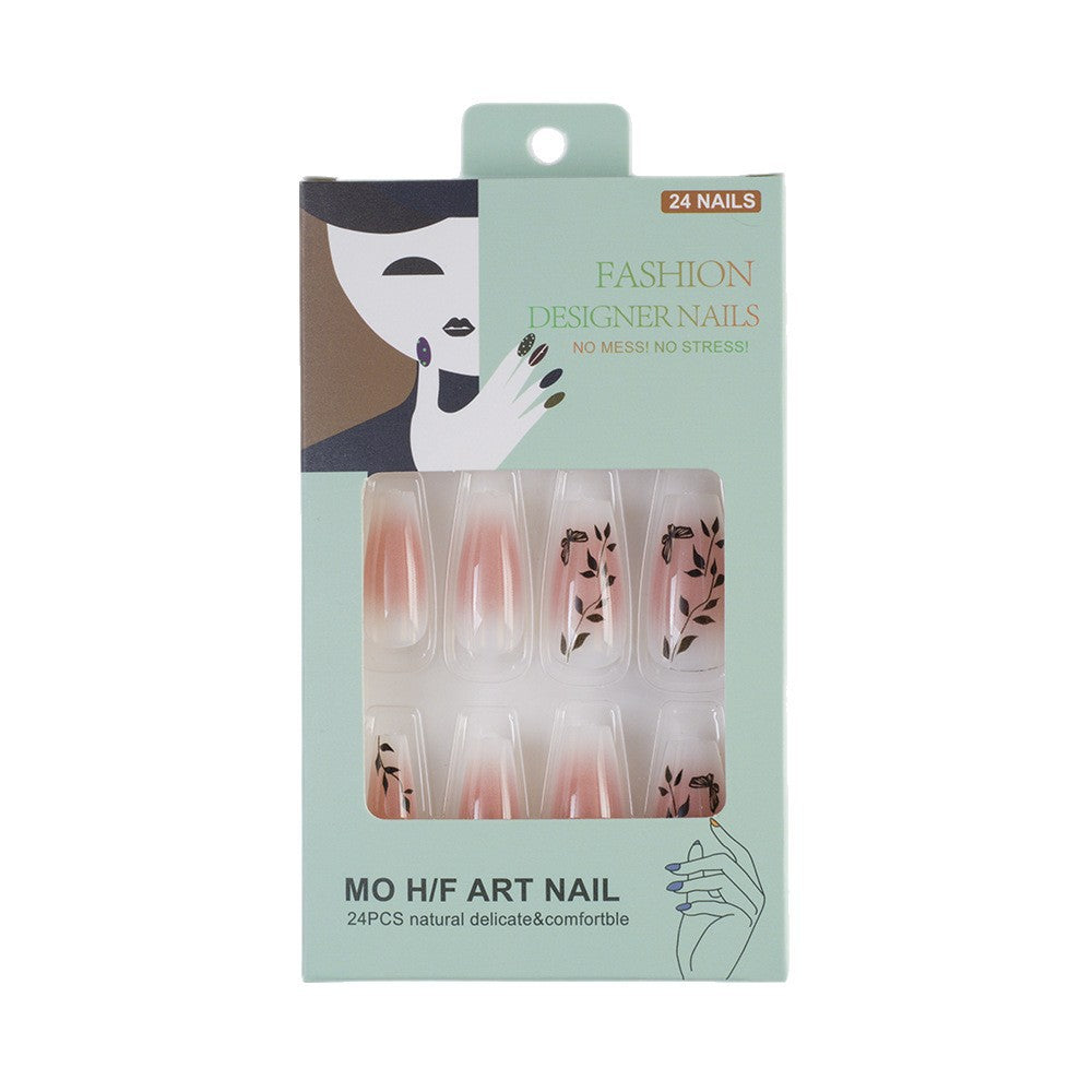 Press-on nails in elegant ombre design with floral accents Bowlift