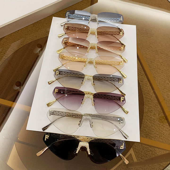 Women Designer Cat Eye Sunglasses with Sparkling Rhinestone Embellishment Bowlift