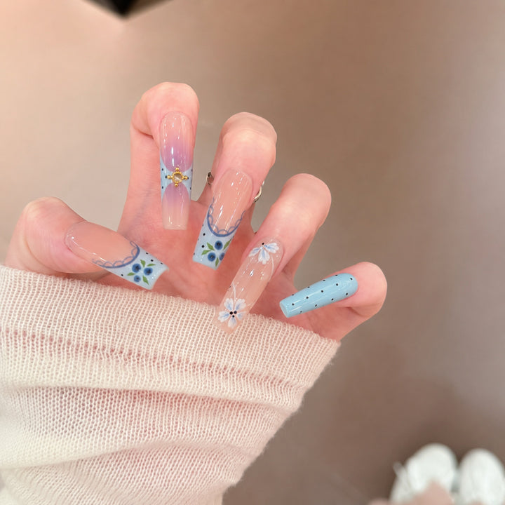 Artistic Press-On Nail Set with Floral and Geometric Design Bowlift