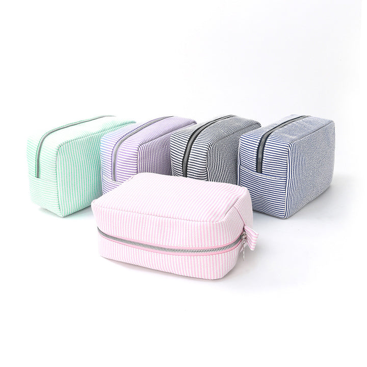 Cosmetic Organizer Bag Made of Textured Material Bowlift