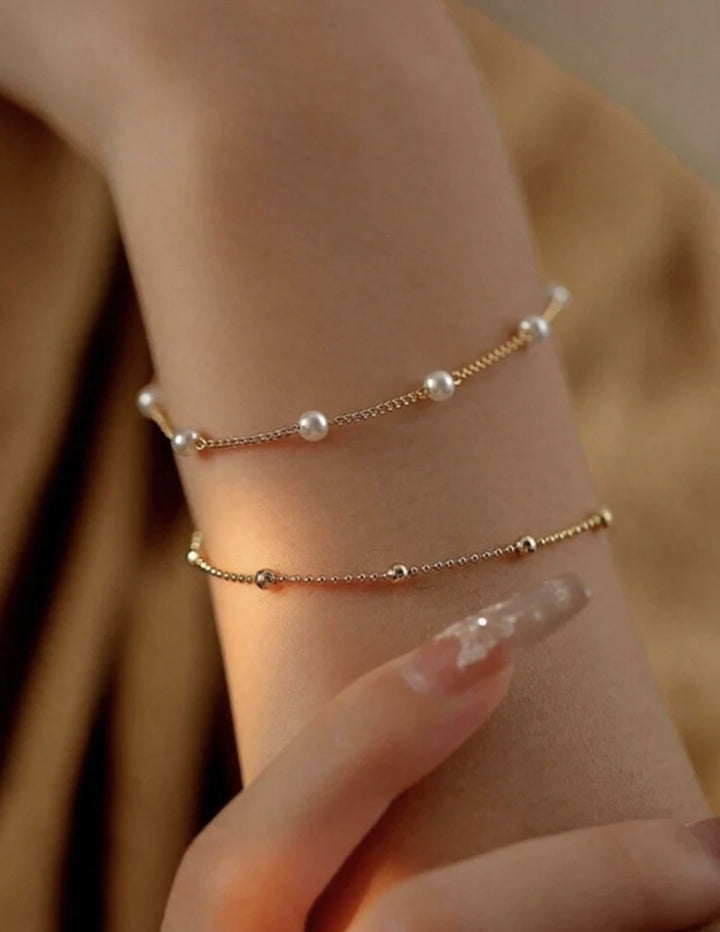 Adjustable Pearl Charm Bracelet Bowlift