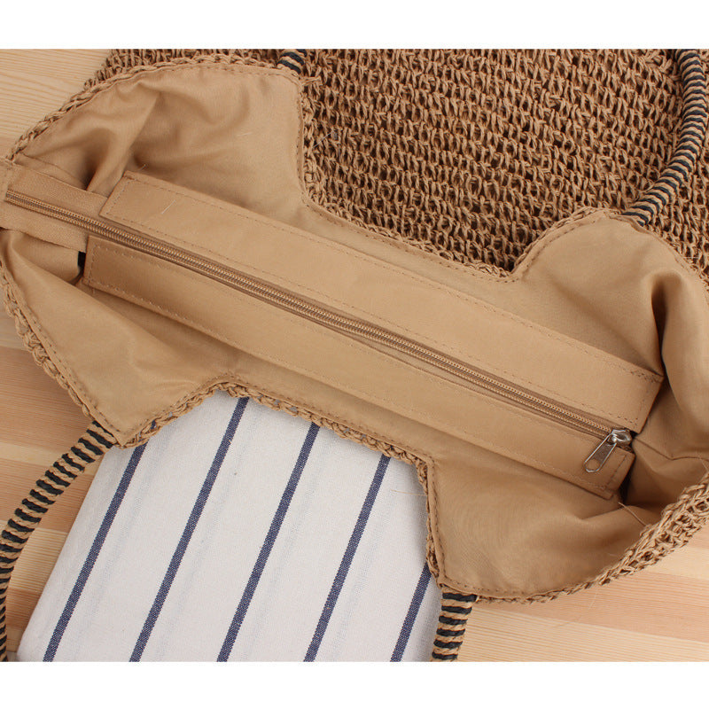 Handmade straw shoulder bag with structured design Bowlift