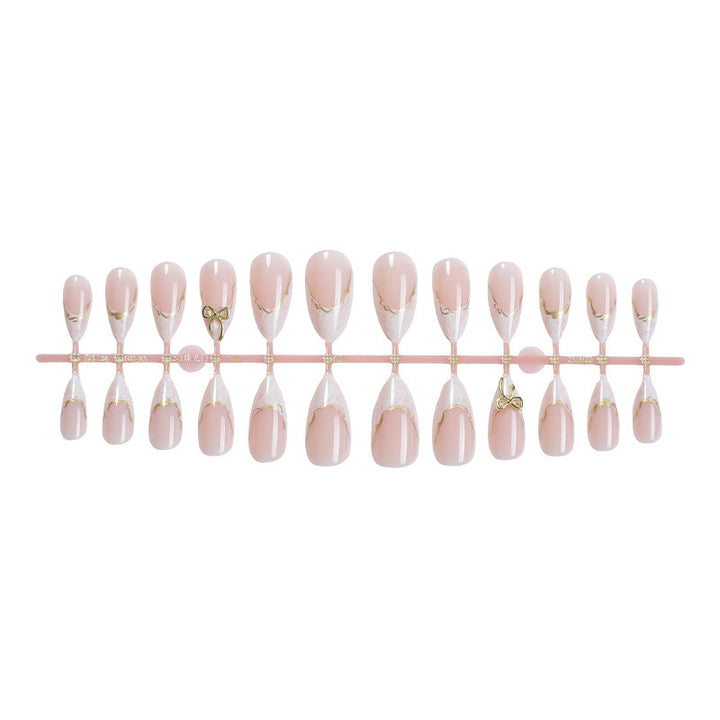 Elegant Press-On Nail Art with Gold Accents Bowlift