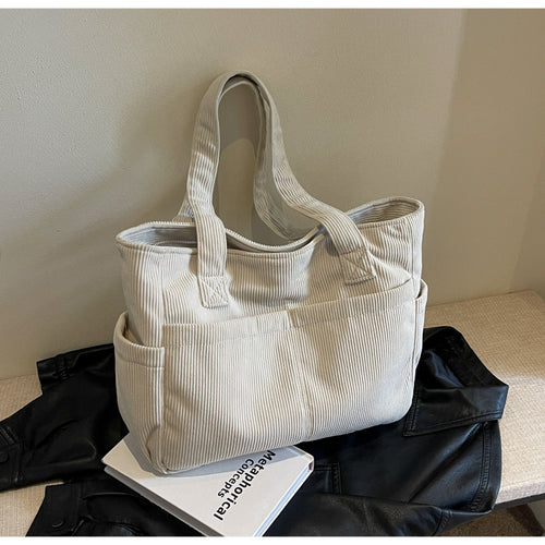 Multifunctional shoulder bag with large outer pockets Bowlift