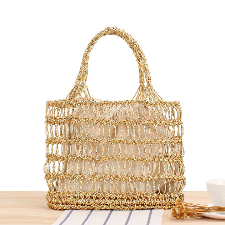 Shoulder bag made of punched metal grid Bowlift