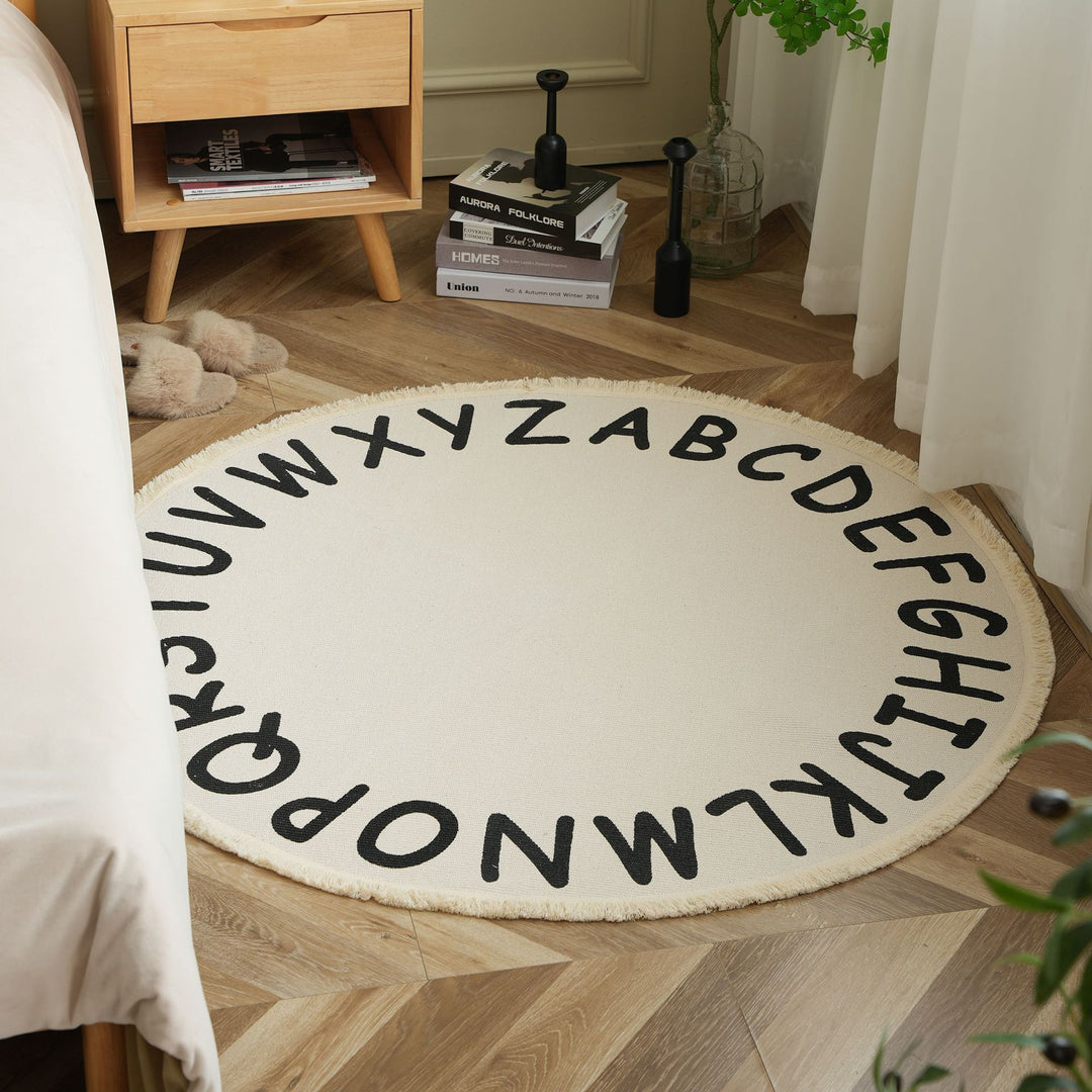 Round woven rug with mandala motif, flat cotton-jute mix and fringes Bowlift