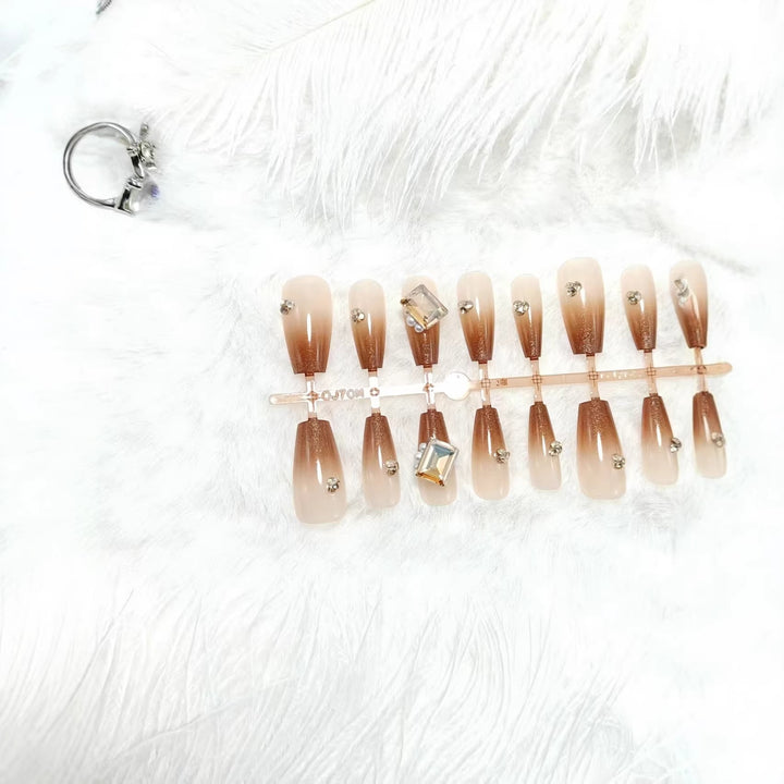 Artificial nails with glitter and ombre effect Bowlift