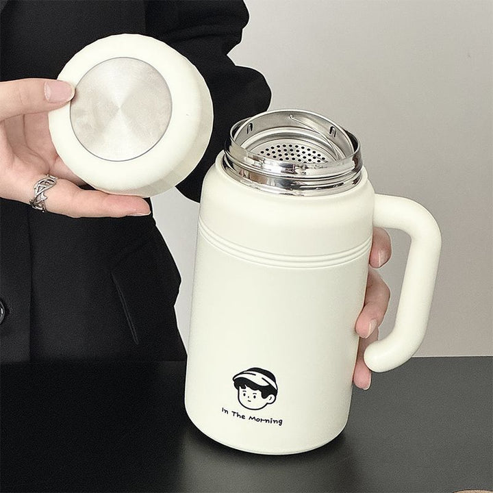 Women’s insulated carafe with ergonomic carrying handle and innovative closure system Bowlift