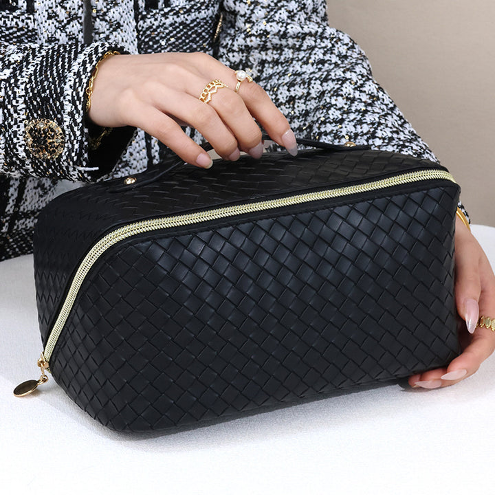 Cosmetic transport bag made of high-quality braided synthetic leather with practical zipper and carrying handle Bowlift