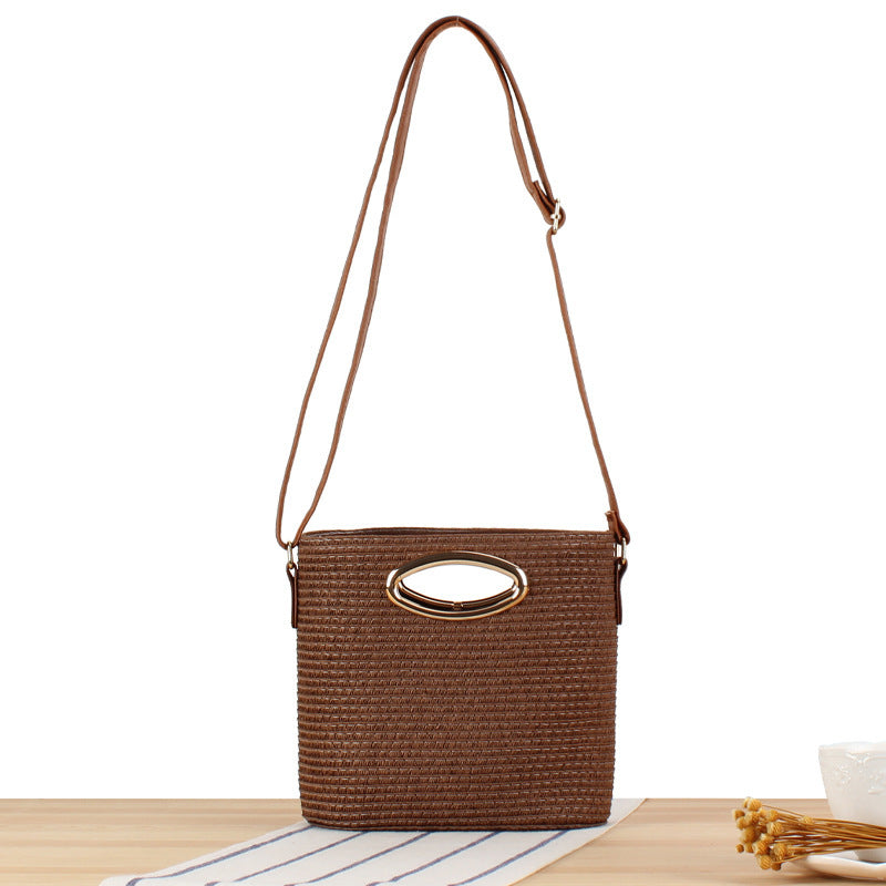 Shoulder bag made of hand-woven natural material with elegant ring closure Bowlift