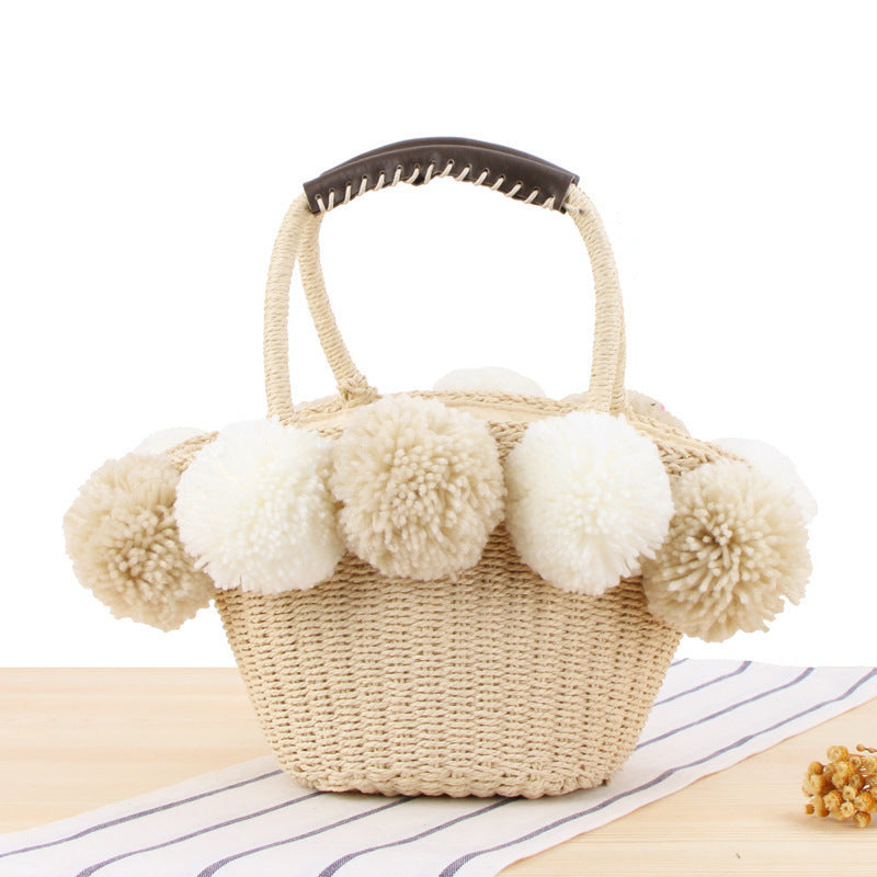 Basket bag with decorative pompons Bowlift