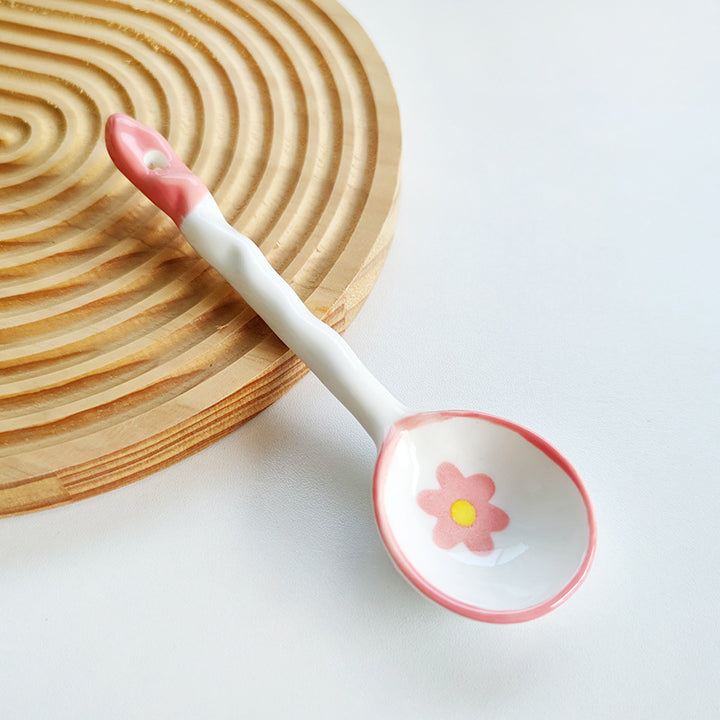 Ceramic soup spoon with lucky cat illustration and ergonomic long-handle Bowlift