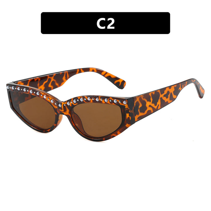 Women's Cat-Eye Sunglasses with Sparkling Rhinestone Accents and Animal Pattern Bowlift
