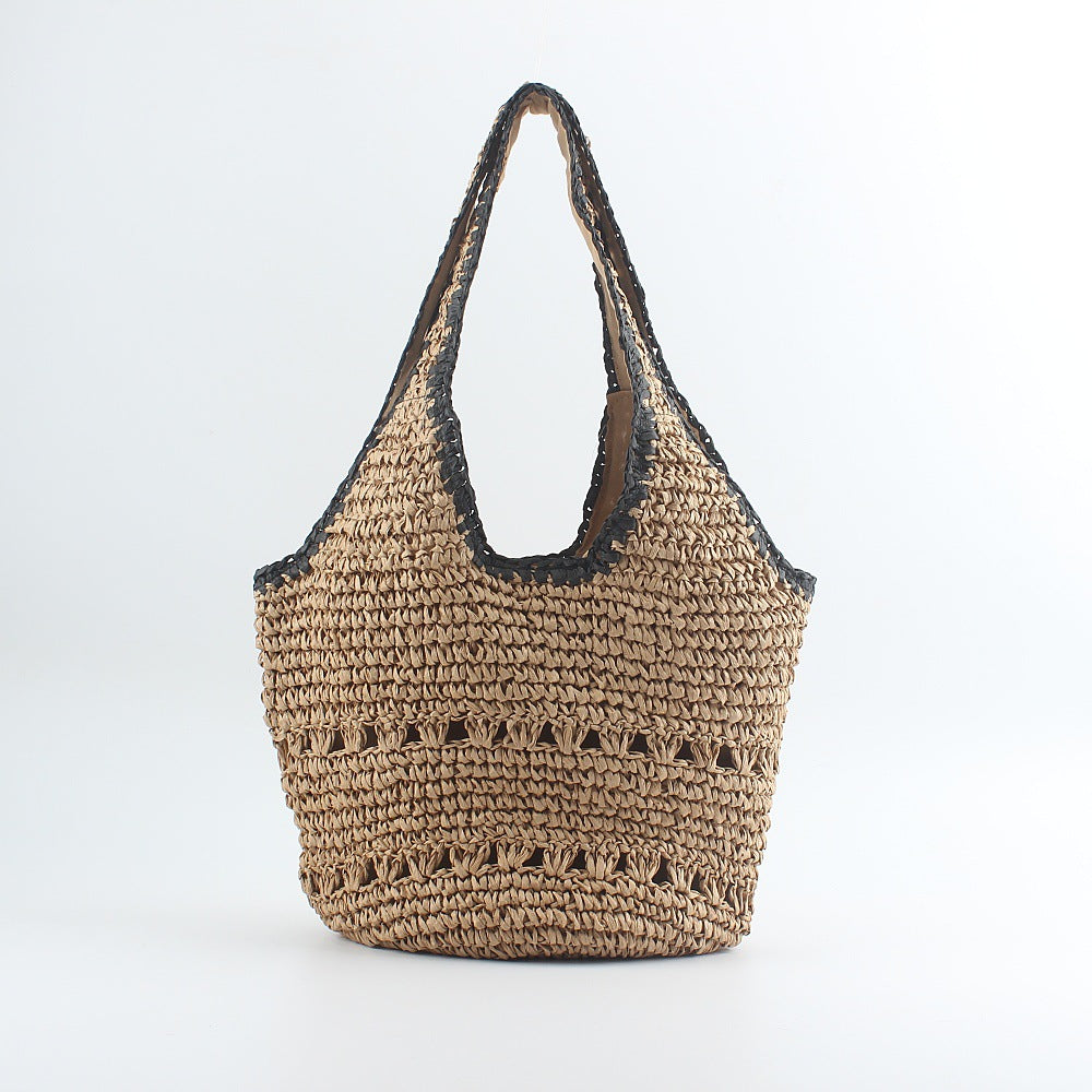 Beach shoulder bag made of hand-woven raffia with elegant lace trims Bowlift