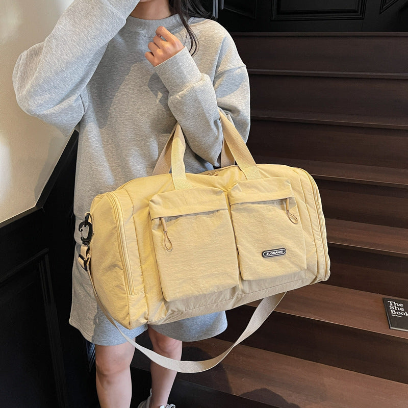 Sporty Travel Bag With Several Exterior Pockets Bowlift