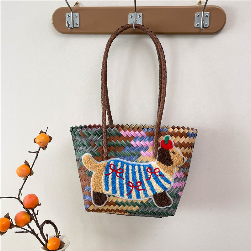 Shoulder bag with playful dog motif Bowlift