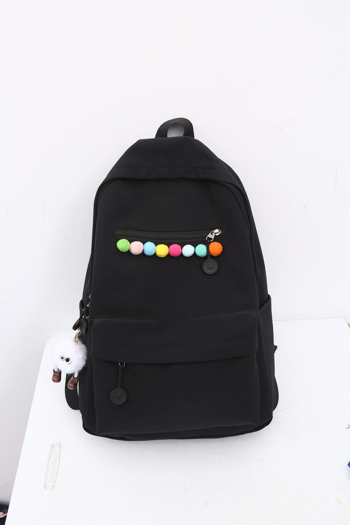 Practical backpack with colorful applications Bowlift