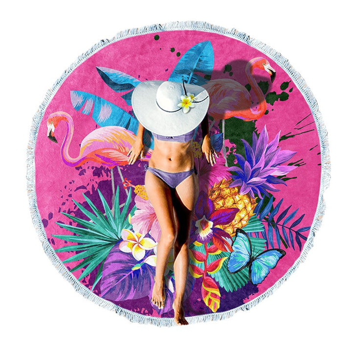 Round beach towel with colorful, tropical floral pattern and fringe decoration Bowlift