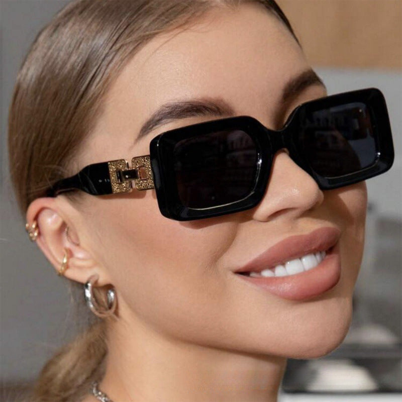 Women’s fashionable sunglasses in elegant square design with luxurious golden accents Bowlift