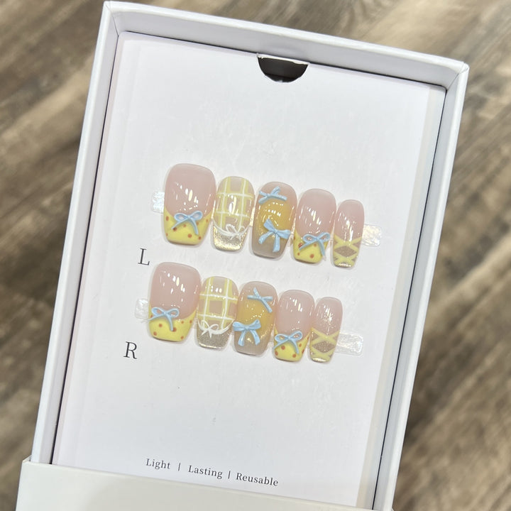 Decorative Press-On Nail Art Set with Charming Bow and Pattern Designs Bowlift