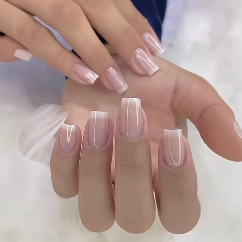 Artificial nails in elegant French design Bowlift