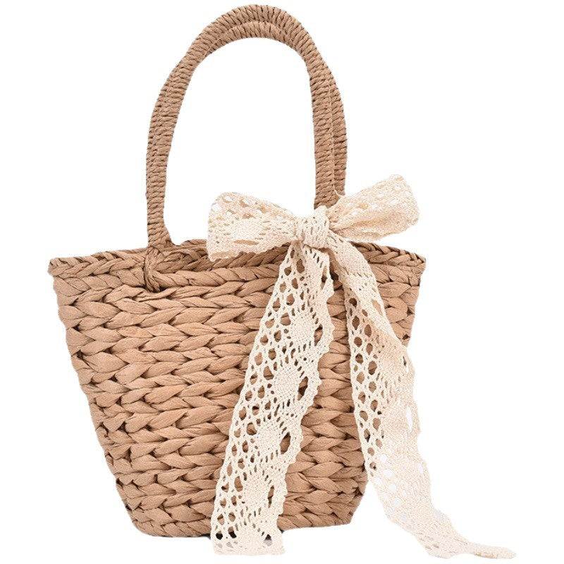 Playful basket bag with lace ribbon Bowlift