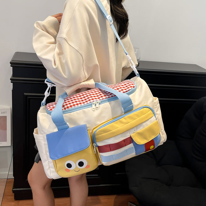 Sporty travel bag with multiple outer pockets Bowlift