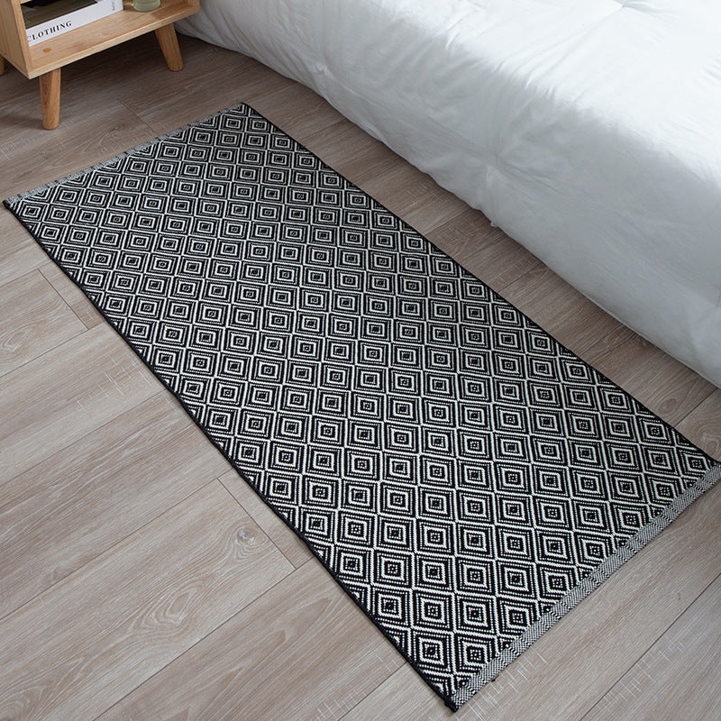 Flat-woven runner rug with check pattern and decorative border stripe Bowlift