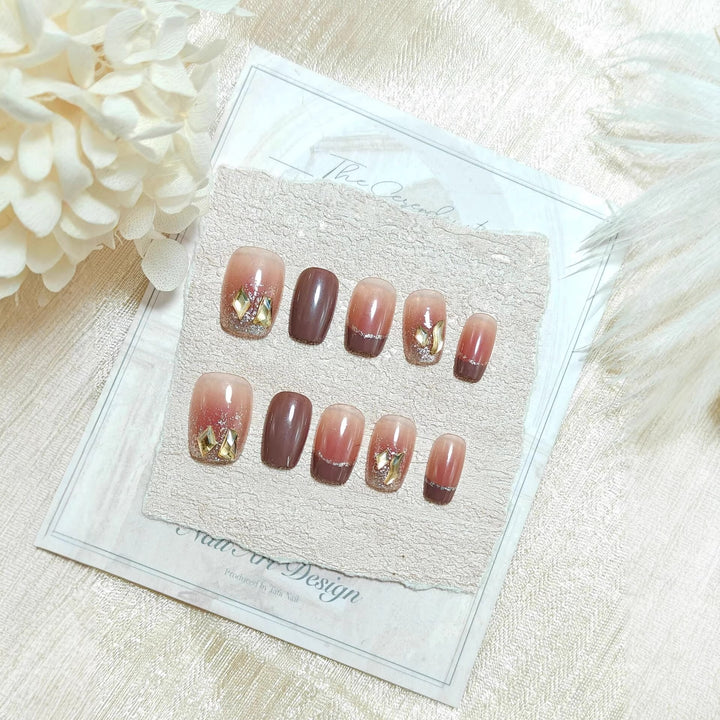 Acrylic nails in elegant ombre design with glitter elements Bowlift