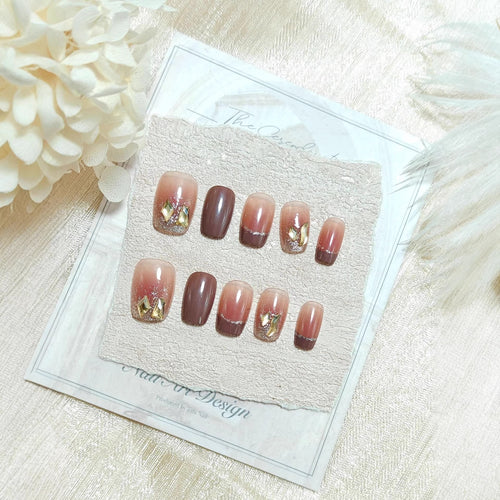 Acrylic nails in elegant ombre design with glitter elements Bowlift