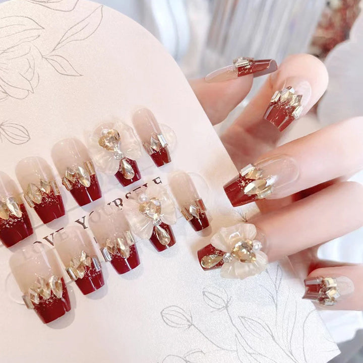 Artificial nails with glamorous floral decorations Bowlift