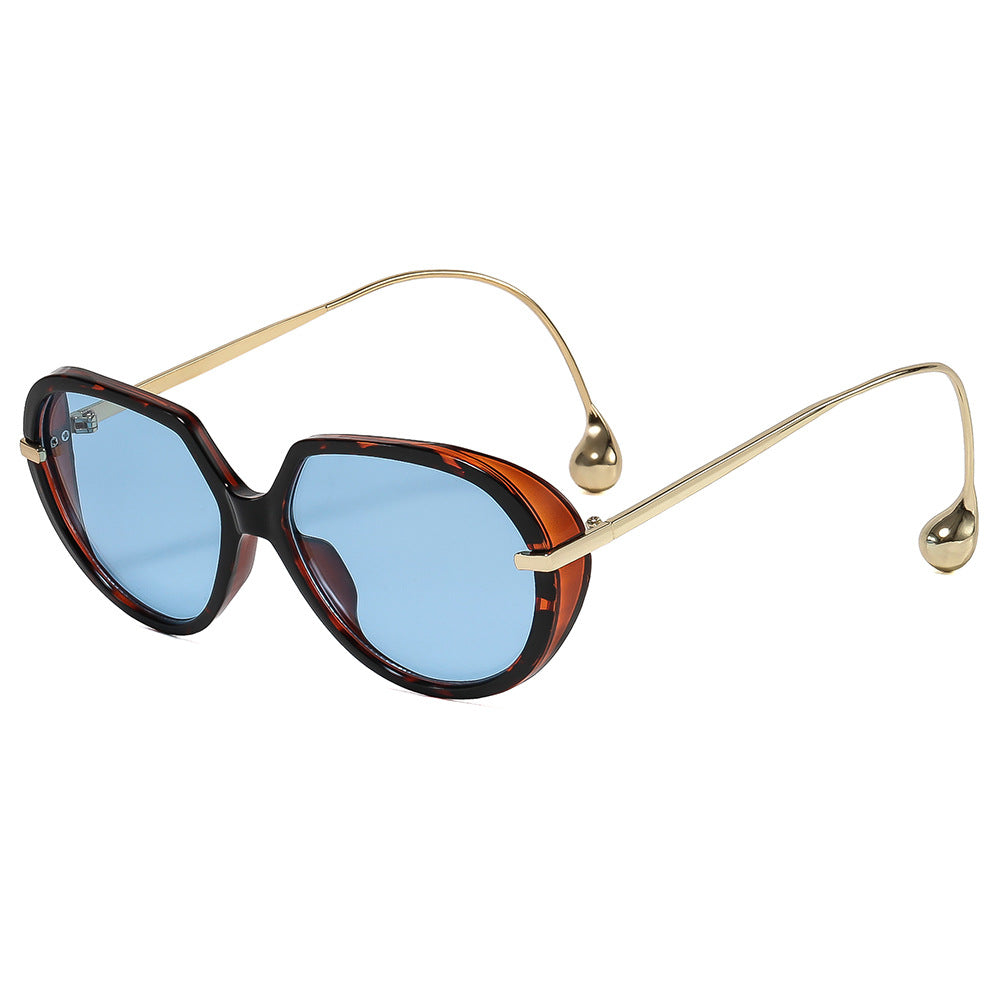 Women's Cat-Eye Sunglasses with Golden Accents and Stylish Frame Bowlift