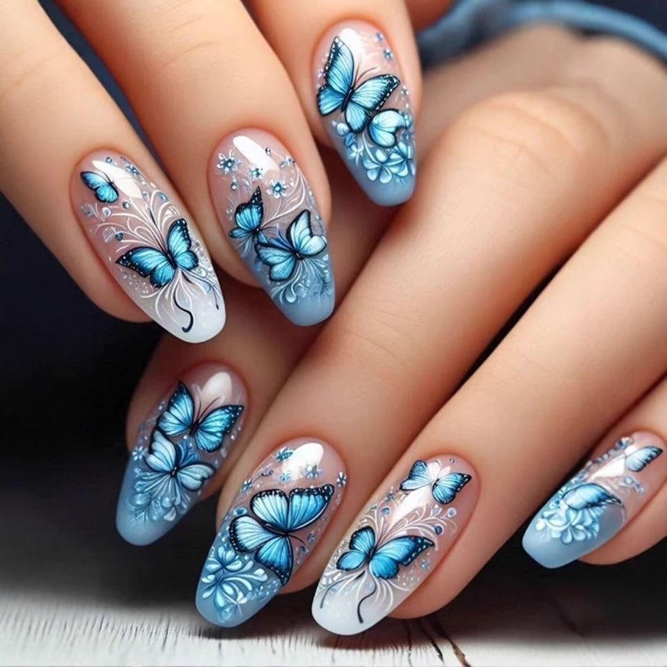 Art nail set with filigree butterfly and flower motifs Bowlift