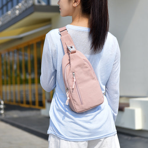 Sling Backpack with Ergonomic Carrying System and Multiple Compartments Bowlift