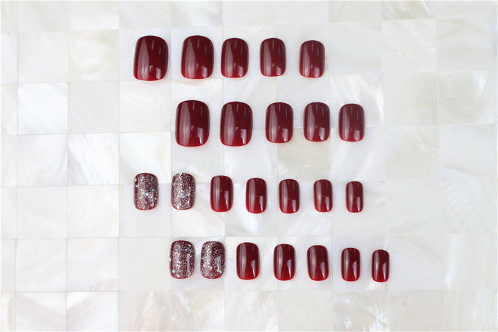 Glossy Press-On Nail Set with Glitter Accents Bowlift