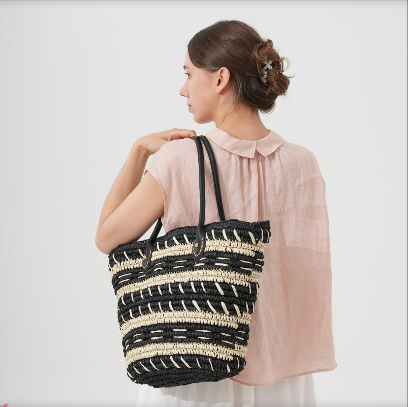 Decorative bast bag with sturdy leather handles Bowlift